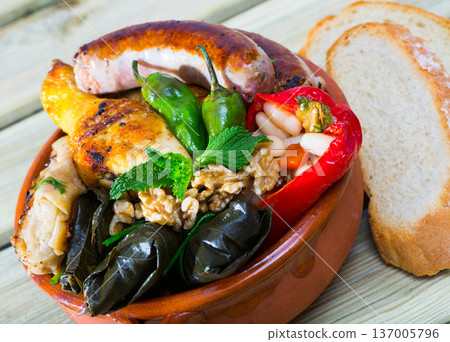 Kapama - sausages, cabbage rolls, dolma Kapama - sausages, cabbage rolls, dolma 137005796