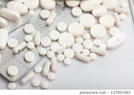 Many different pills and medical capsules close up Many different pills and medical capsules close up 137005965