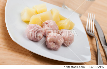 Close up of cooked on steam meatballs, served with potatoes Close up of cooked on steam meatballs, served with potatoes 137005997