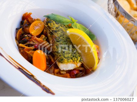 White fish baked with vegetables White fish baked with vegetables 137006027