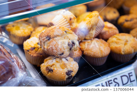 Closeup of various delicious sweet croissants presented on bakery showcase Closeup of various delicious sweet croissants presented on bakery showcase 137006044