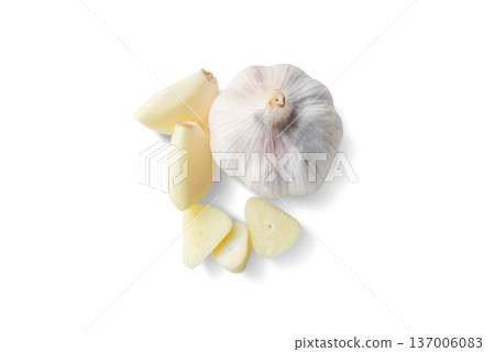 Fresh Garlic Bulb and Sliced Cloves Isolated on White 137006083