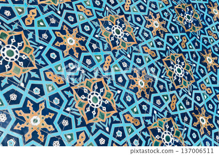 Closeup of a blue yellow Islamic ceramic tile pattern Closeup of a blue yellow Islamic ceramic tile pattern 137006511
