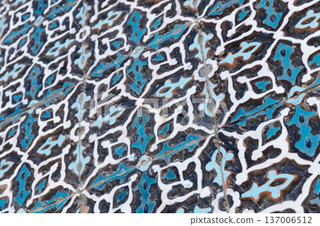 Closeup of a blue Islamic ceramic tile pattern, mosque wall Closeup of a blue Islamic ceramic tile pattern, mosque wall 137006512