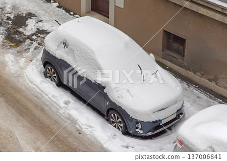 Car Under Snow Street 137006841