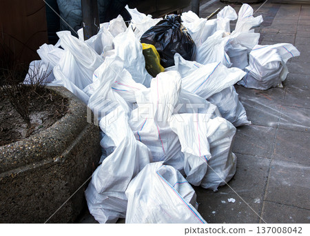 Large pile of garbage on street 137008042