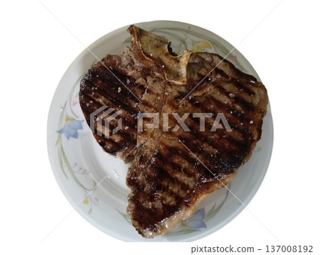 Grilled t bone steak with salt on a plate Grilled t bone steak with salt on a plate 137008192