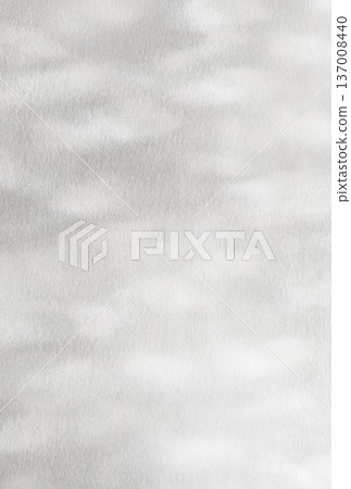 A vertical background image of a soft, silvery shimmering light pattern. 137008440