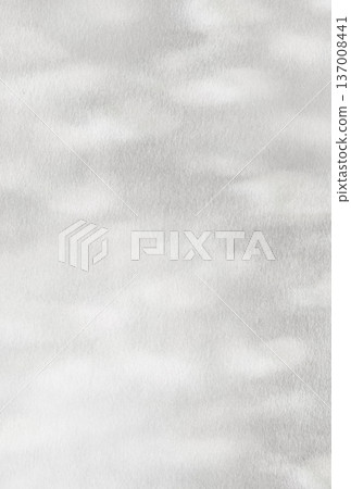 A vertical background image of a soft, silvery shimmering light pattern b 137008441