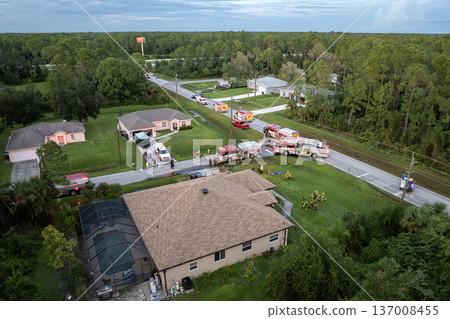Firefighters investigating fire hazard on residential street in North Port in Florida Firefighters investigating fire hazard on residential street in North Port in Florida 137008455