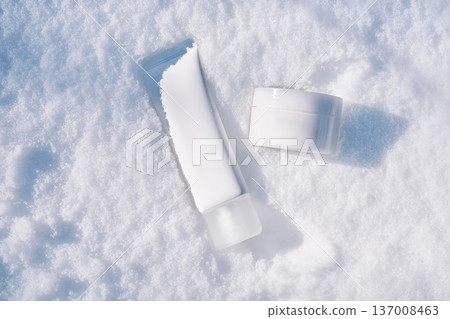 Winter skincare concept with cosmetic products on snow 137008463