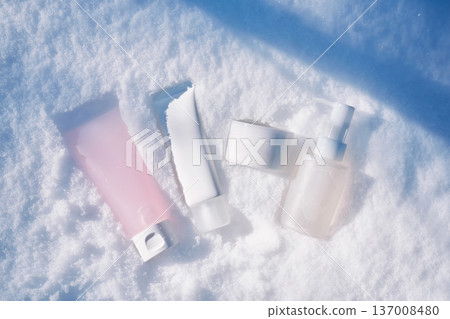 Skincare cosmetic products for winter skin hydration in snow Skincare cosmetic products for winter skin hydration in snow 137008480