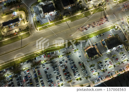 Traffic rush at shopping malls and small businesses in evening time in North Port, Florida. USA transportation and retail infrastructure concept 137008563