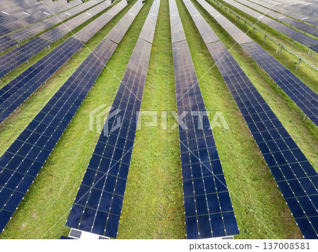 Large-scale solar photovoltaic power station producing clean and sustainable electricity without harmful emissions. Example of modern green energy infrastructure 137008581