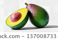Ripe avocado with half cut open and seed visible, isolated on white background in studio shot. 137008733