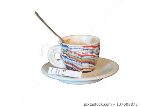 Empty colorful espresso cup on saucer with spoon Empty colorful espresso cup on saucer with spoon 137008878