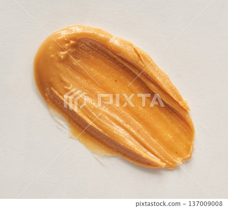 Smooth Peanut Butter Spread On White Background Highlighting Creamy Texture And Rich Flavor 137009008