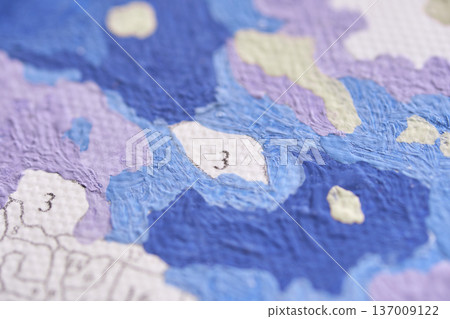 Detailed close-up of a colorful abstract map with numbers and blue areas 137009122