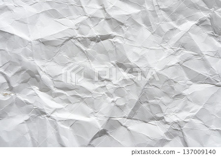 Crumpled white paper texture with creases and wrinkles for background design 137009140