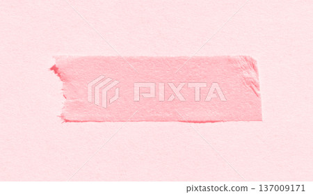 Pastel pink strip of duct tape on textured paper background for creative and artistic design 137009171
