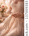 Close-up of Woman in Ornate Pink Gown Putting on Silk Gloves 137009383