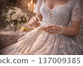 Close-up of Woman in Ornate Pink Gown Putting on Silk Gloves 137009385