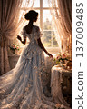 Elegant Woman in Exquisite Ornate Gown Looking Out a Sunlit Window 137009485
