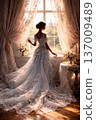 Elegant Woman in Exquisite Ornate Gown Looking Out a Sunlit Window 137009489