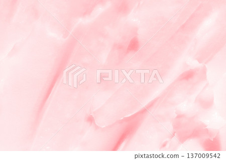 Smooth pastel pink cream texture with soft swirls and gentle highlights for skincare or cosmetic 137009542