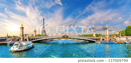 Front panorama of Alexandre III Bridge with Eiffel Tower and tour Boats on the Seine River, Paris, France 137009799