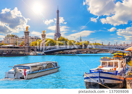 Alexandre III Bridge with Ships on the Seine River and Eiffel Tower behind, Paris, France 137009806