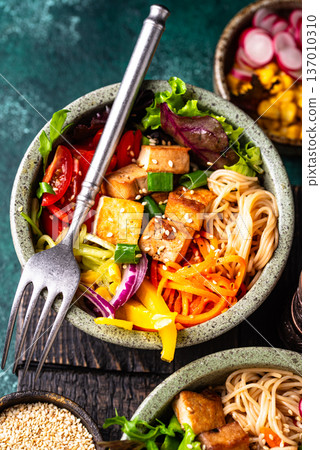 Vegan healthy poke bowl with tofu 137010310