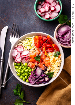 Balanced healthy bowl with vegetables and salmon 137010312