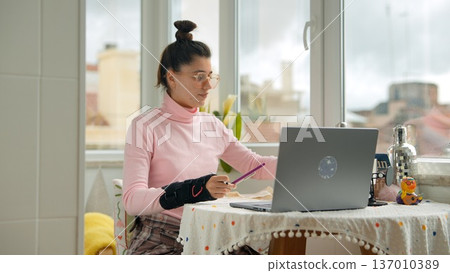 Strategic thinker placing ideas beside urban landscape window 137010389