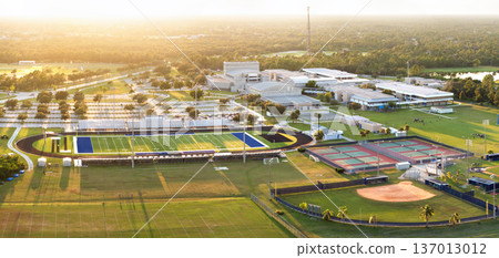 High school sports facilities in Florida. American football stadium, tennis court and baseball diamond sport infrastructure High school sports facilities in Florida. American football stadium, tennis court and baseball diamond sport infrastructure 137013012