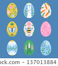 Nine decorated Easter eggs with floral, animal and carrot patterns on blue background 137013884