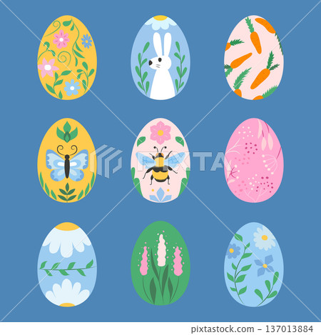 Nine decorated Easter eggs with floral, animal and carrot patterns on blue background 137013884