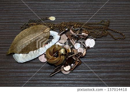 Pile of gold jewelry 137014418