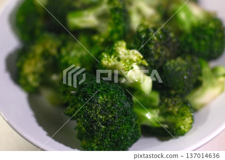 Fresh Broccoli Head on Rustic Surface Fresh Broccoli Head on Rustic Surface 137014636