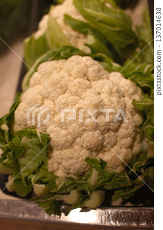Fresh Broccoli Head on Rustic Surface Fresh Broccoli Head on Rustic Surface 137014638