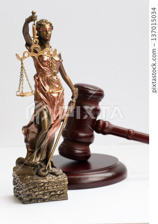 Themis figure and judge's gavel on white background Themis figure and judge's gavel on white background 137015034