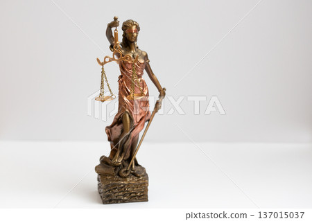 Themis on a white background. The concept of court and justice in the legal field. 137015037
