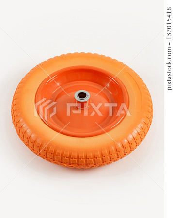 Wheel is pneumatic on a white background. Orange rubber and disc. Wheel is pneumatic on a white background. Orange rubber and disc. 137015418