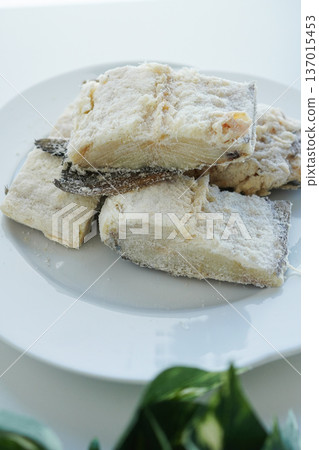 Portuguese/Spanish food bacalao close-up white background 137015453