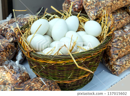Goose eggs in wicker basket Goose eggs in wicker basket 137015602
