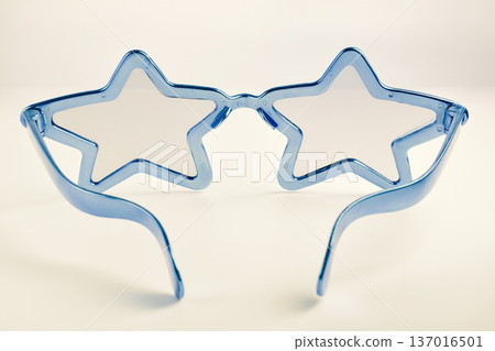blue star shape of glasses on old sepia background 137016501