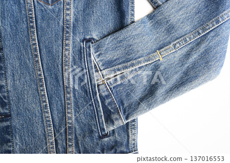 sleeve of blue denim shirt texture isolated on white background, jean fashion style sleeve of blue denim shirt texture isolated on white background, jean fashion style 137016553