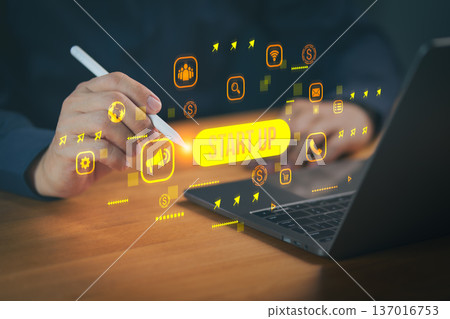Person using a digital pen and laptop with startup icons, representing innovation, entrepreneurship, digital marketing, business development, online strategy, and modern technology-driven startups. Person using a digital pen and laptop with startup icons, representing innovation, entrepreneurship, digital marketing, business development, online strategy, and modern technology-driven startups. 137016753