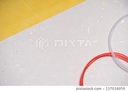 Yellow Japanese paper and Mizuhiki background material 137016959