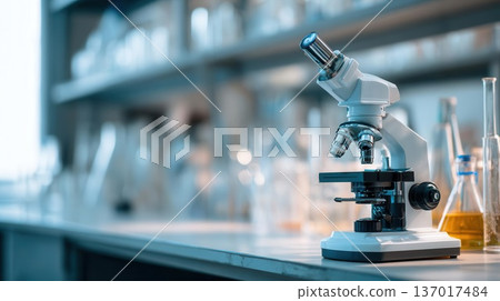 Scientific Microscope in Lab with Test Tubes and Bottles 137017484